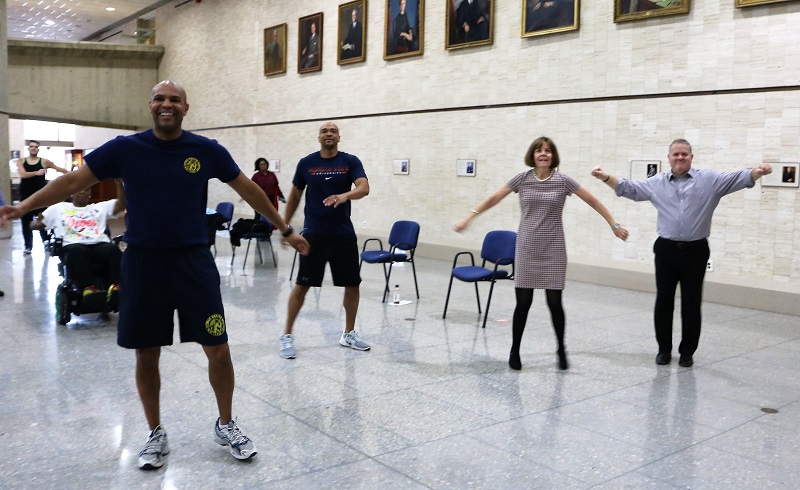VADM Adams, Robertson, and Lazare participating in Zumba