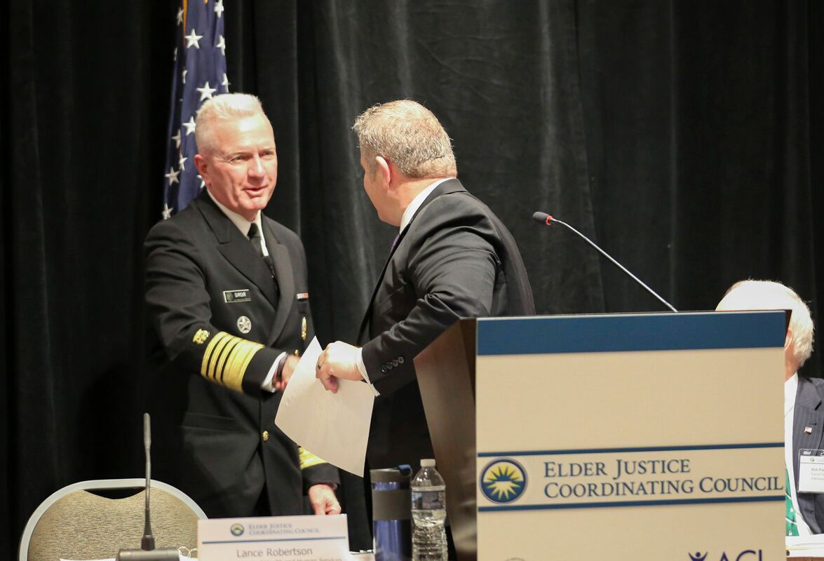 Assistant Secretary for Aging Lance Robertson greets Assistant Secretary for Health ADM Brett P. Giroir