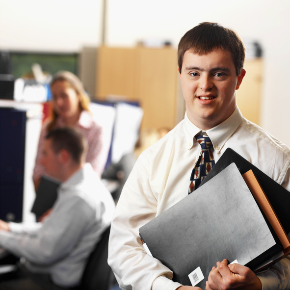 Man with Down Syndrome at work