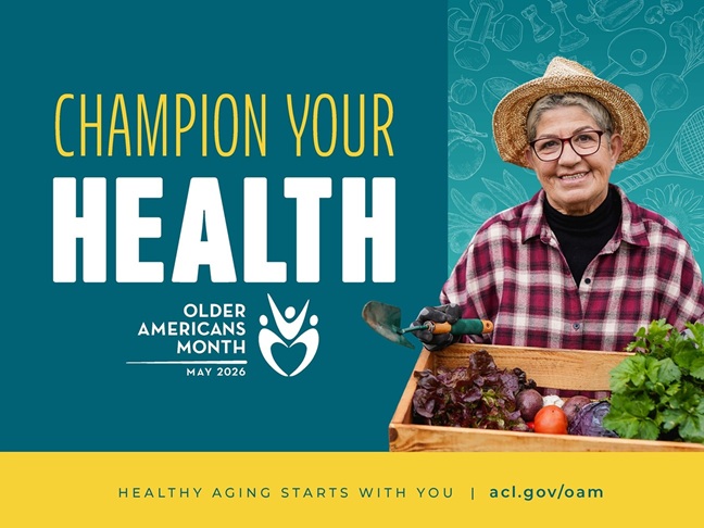 OAM 2026 poster with the theme, "Champion your health," the oam logo, and an older white woman wearing a straw hat, glasses, and a plaid shirt who's smiling while holding a wooden crate filled with fresh vegetables—leafy greens, tomatoes, and root vegetables.