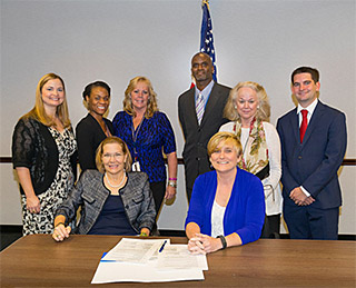 Photo of ODEP and ACL signing a new memorandum of agreement on September 11, 2015